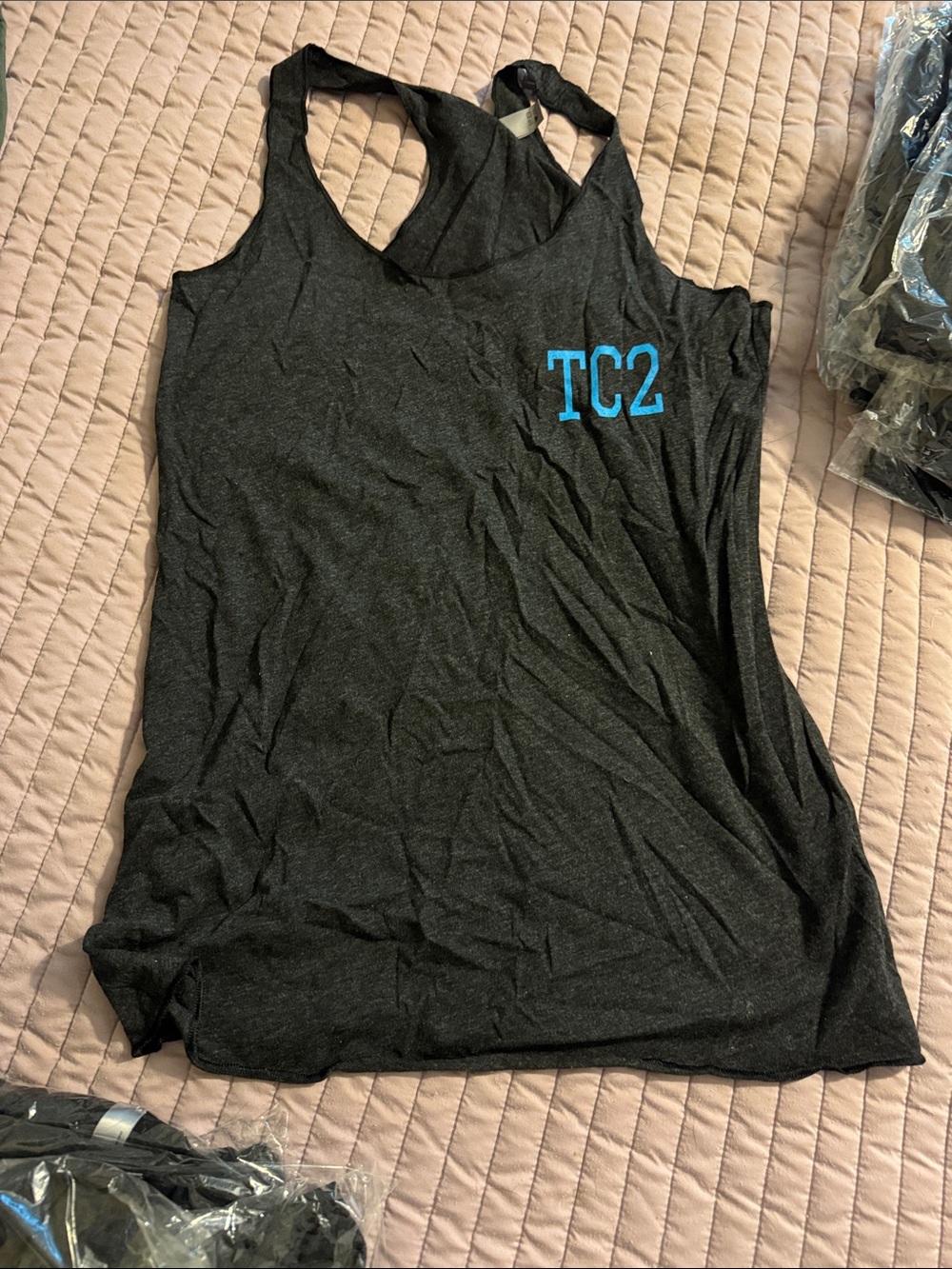 Next Level Apparel Black Racerback Tank with Teal TC2 Logo